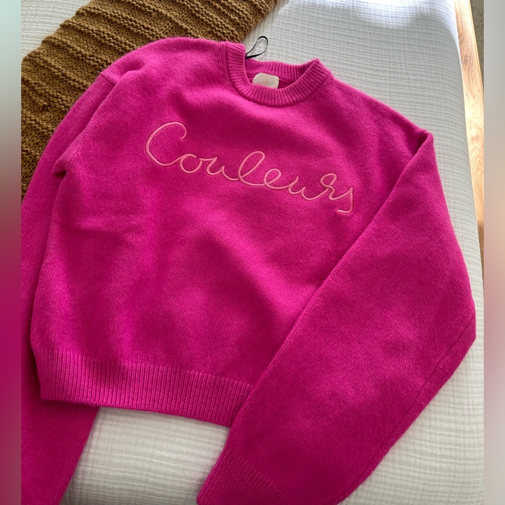 Pink woman’s sweater